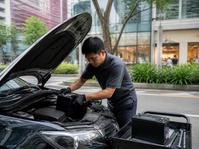Car Battery Replacement Tampines | 24Hr Onsite | AAP 1 AAP technician replacing a car battery in Tampines, Singapore